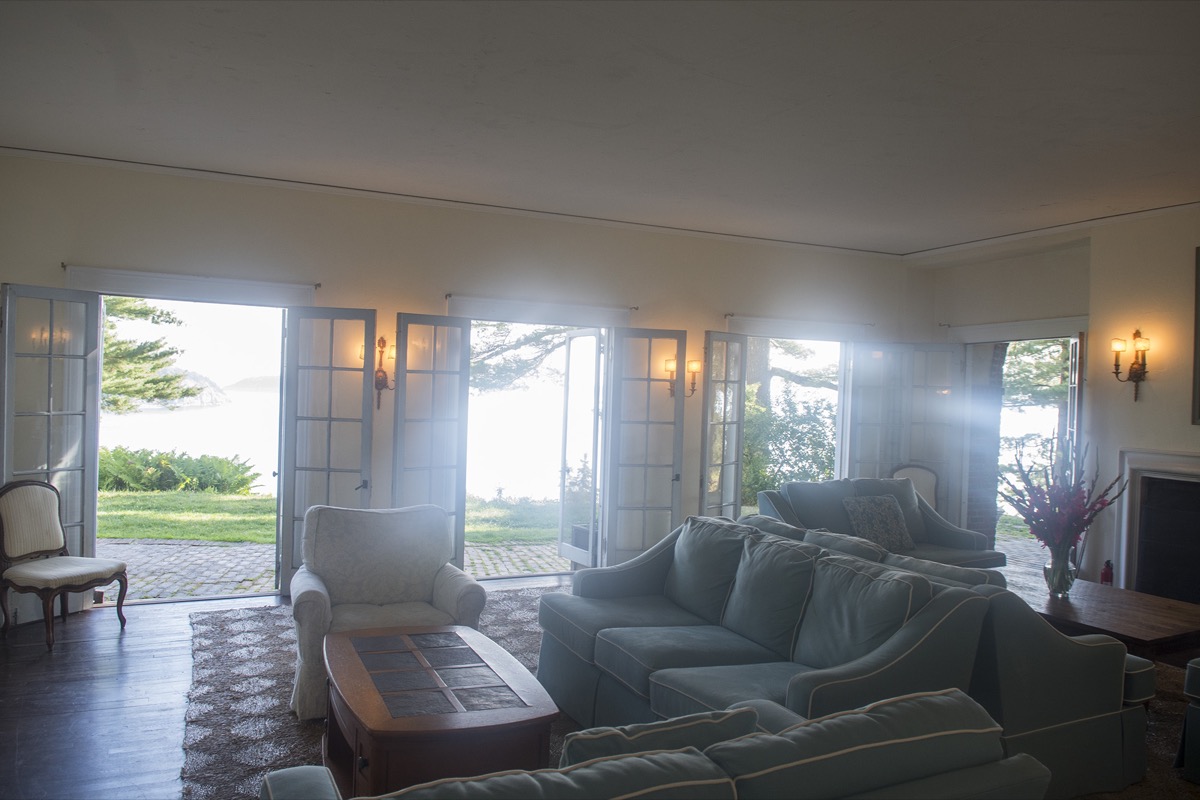 The living room with French doors on both sides
